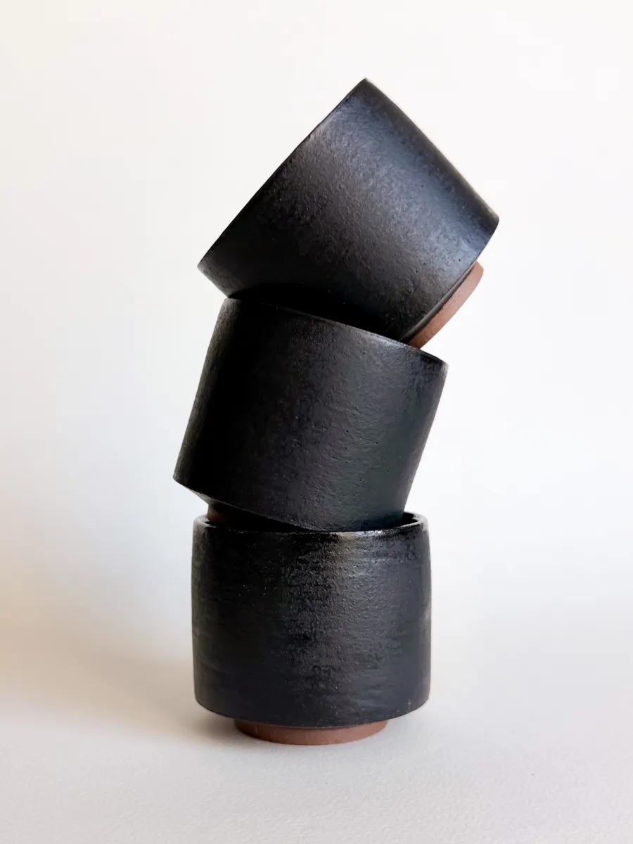 A stack of matte black Cup No. 2