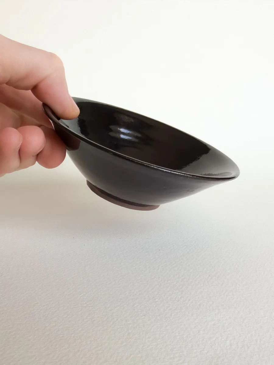 Small angular glossy black bowl