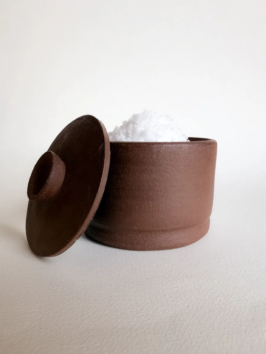 Salt cellar with a fitted lid