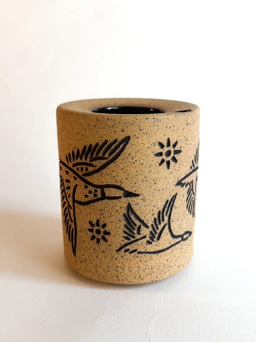 Travel cup with hand-carved ducks, unglazed speckled clay