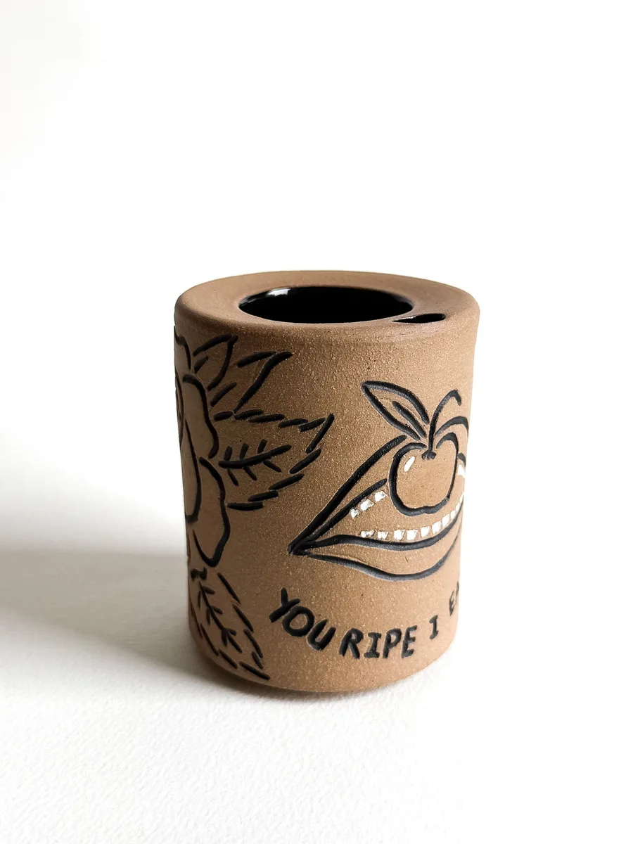 Travel cup carved with roses and the words You Ripe I Eat You