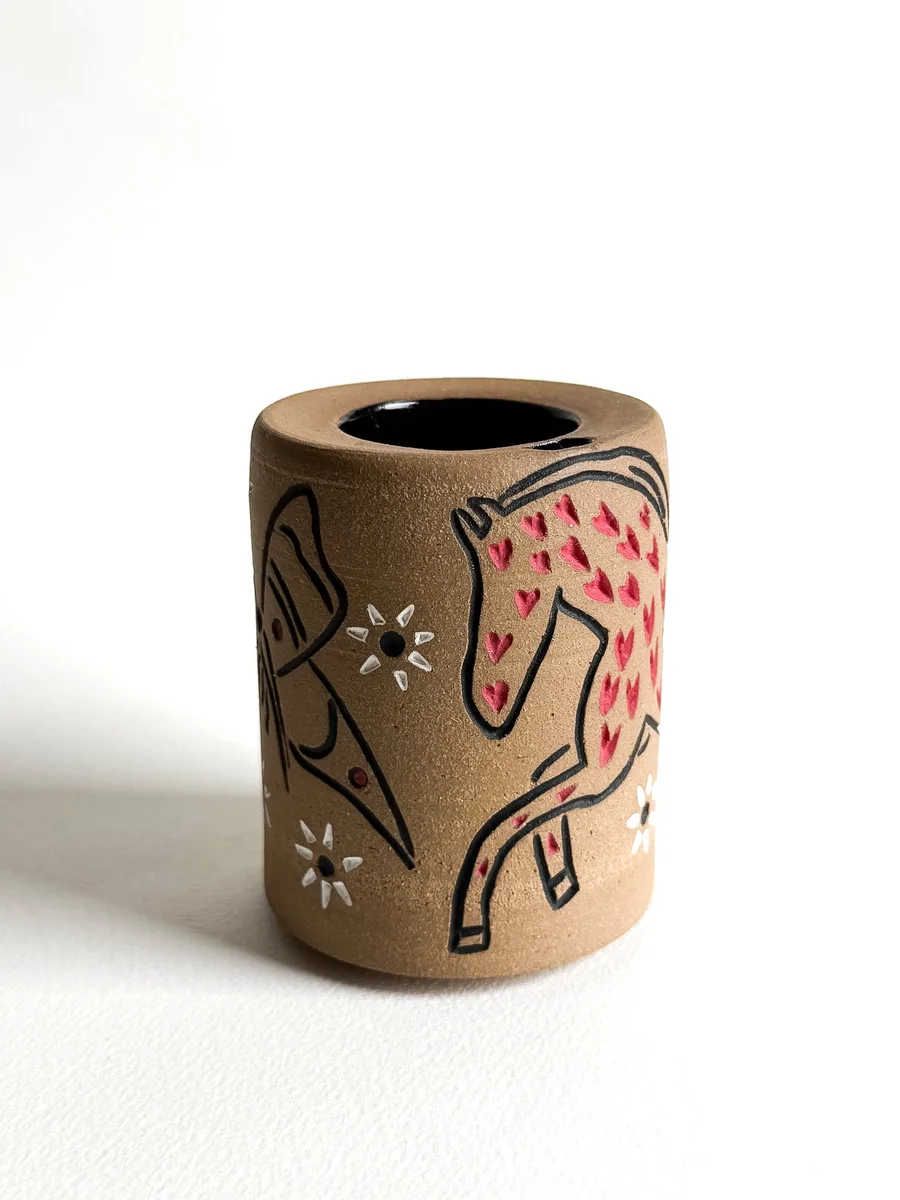 Second travel cup carved with the Rosie Camanga horse design