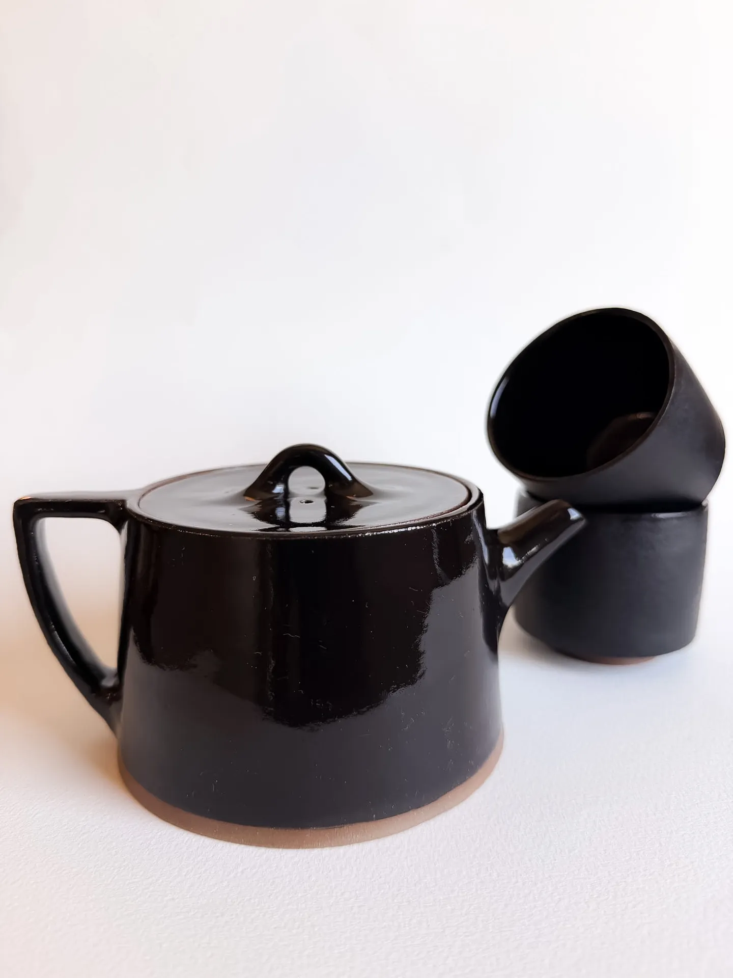 Teapot with two matching cups