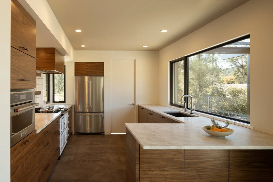 Hudson House kitchen with wood cabinetry and island; Desert Concepts, Southern Utah residential design