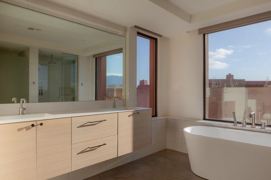 Bathroom with freestanding bath and walk-in shower; Desert Concepts, Southern Utah residential design