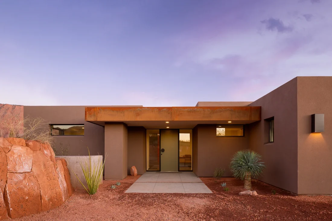 Opel home exterior with desert landscaping; Southern Utah residential design and remodeling