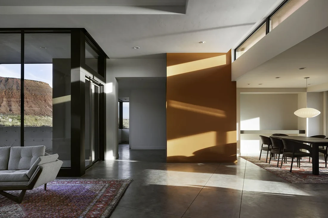 Living room with large windows and desert views; Desert Concepts, Southern Utah residential design
