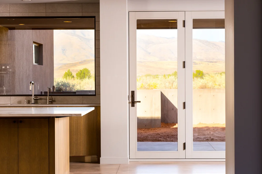 Yamka House kitchen and courtyard doorway; Desert Concepts, Southern Utah residential design